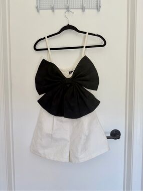 White Romper with Dramatic Black Bow